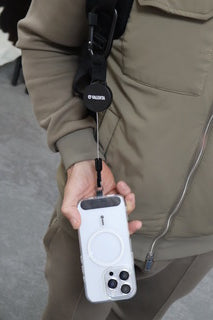 Retractable anti-theft phone cord with carabiner